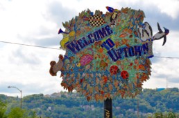 Street art of an “Uptown” sign in Pittsburgh.