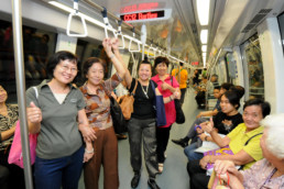 People on a Singaporean metro.