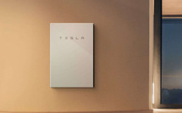 Product shot of a Tesla Powerwall renewable energy system.