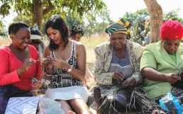 Men and women working with textile. Nest .