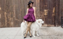 Mode wearing a VAUTE dress with a dog.