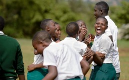 Boys playing football. Educate!