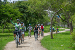 People bicycling in Loja.