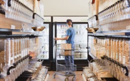 Man in a package free grocery store.