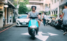 Man on a Gogoro scouter.