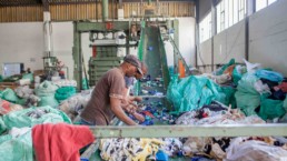 Man sorting waste in Cape Town for the Western Cape Industrial Symbiosis Programme.