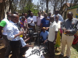 Men gathered for a meeting in Kisumu, Kenya.