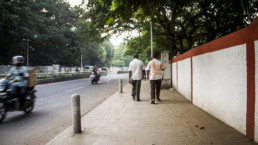 Men walking in Chennai, India.