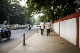 Men walking in Chennai, India.