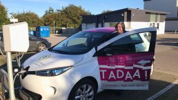 Woman in a TADAA! electric vehicle in Aarhus Municipality.