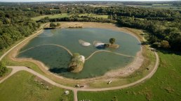 The new Glisholm Sø lake, collects rainwater in the growing southern part of Odense and offers a recreation area rich with plant and animal life.