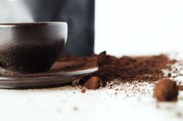 Coffee grounds and a coffee mug