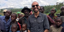 Man in Africa with children and adults